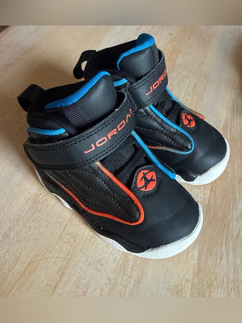 Jordan Kids' Black Sneakers with Blue and Orange Accents